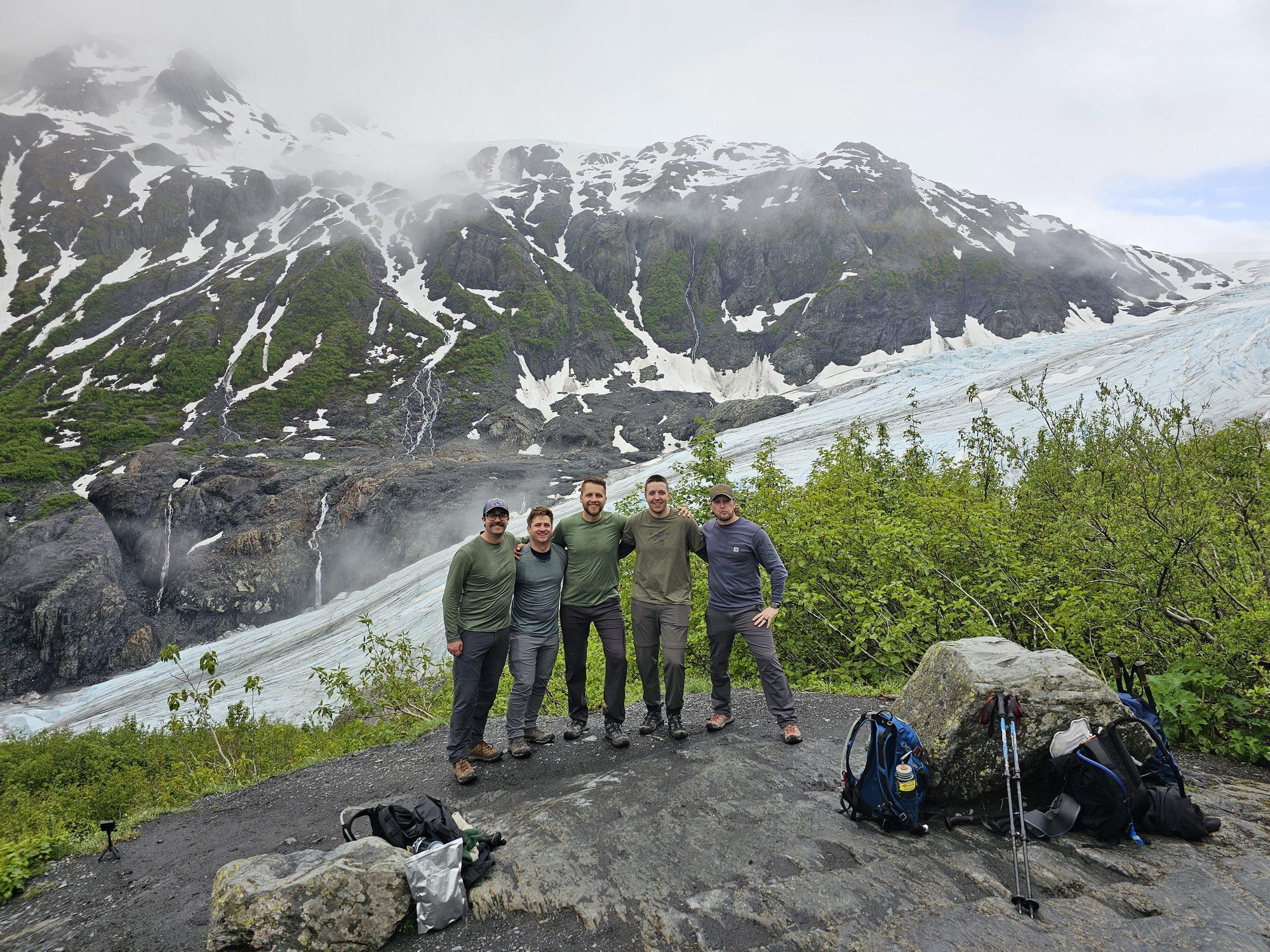 The crew in front of a glacier in Alaska