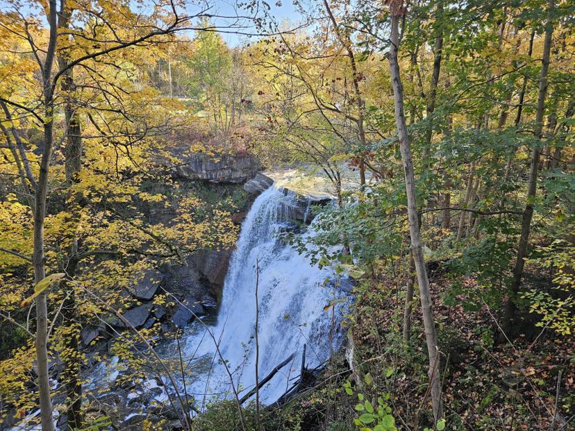 A waterfall surrounded by autumn colour at Cuyahoga