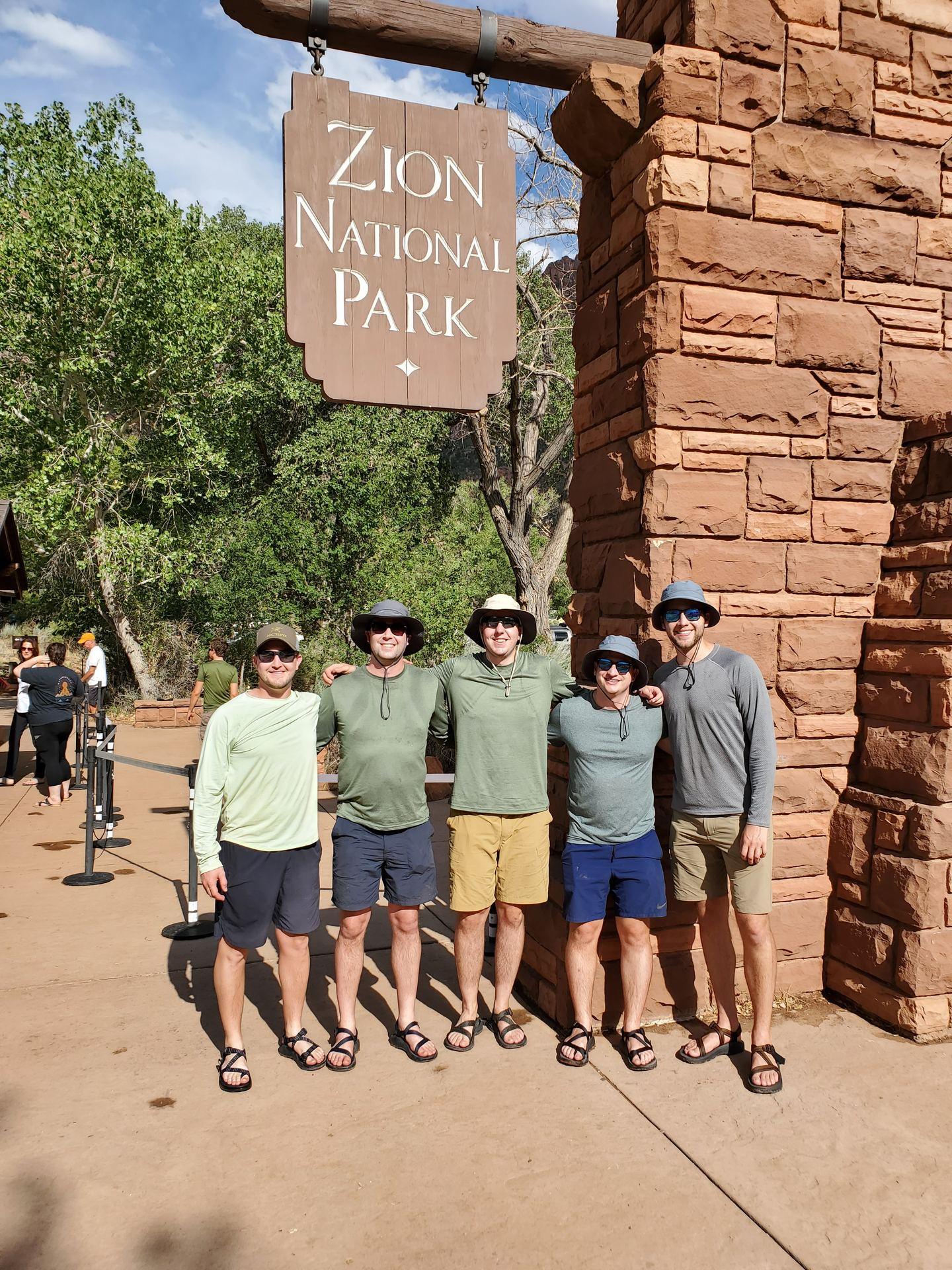 The crew at the Zion National Park entrance sign
