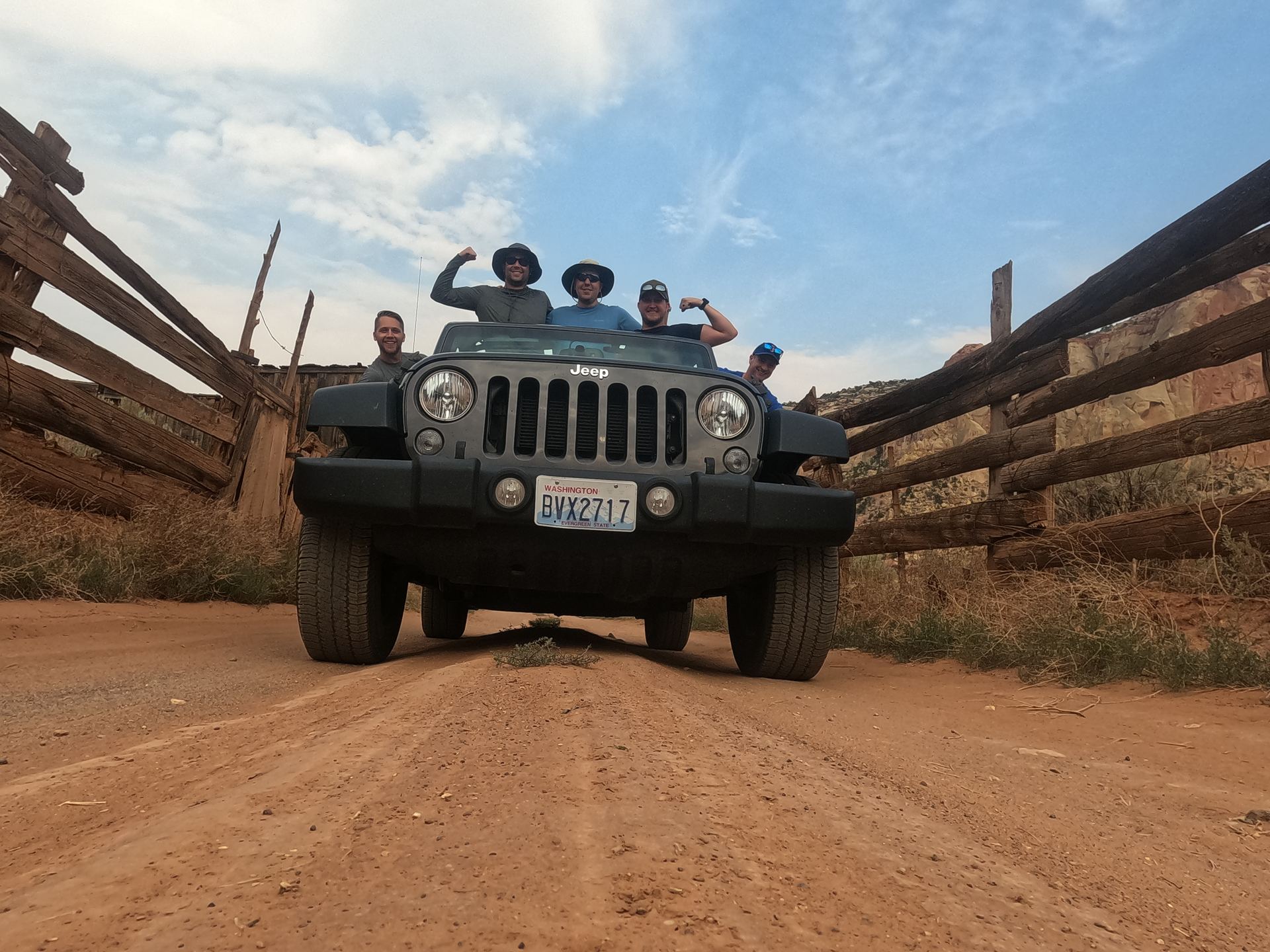 The crew riding in a jeep near Moab