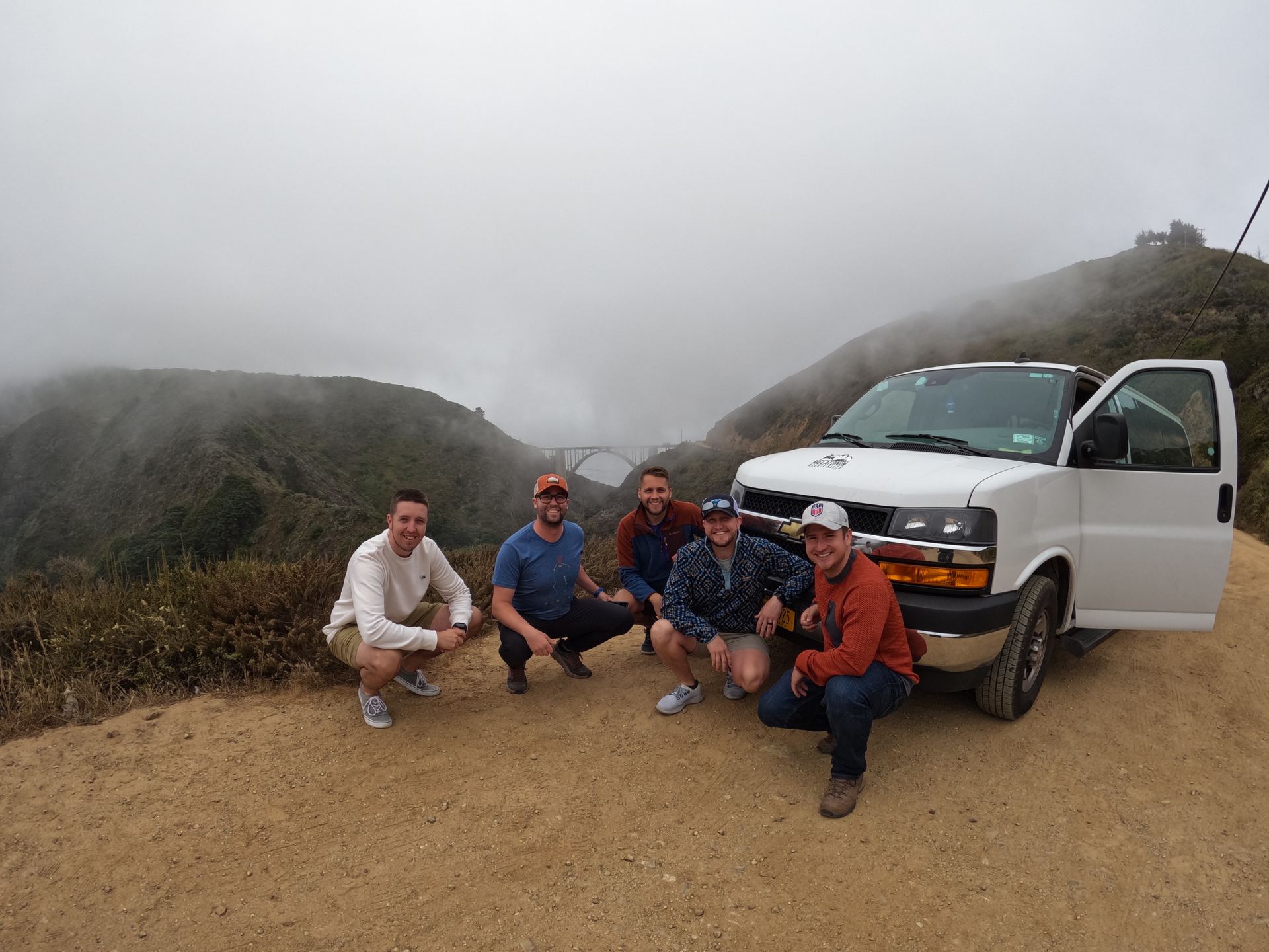 The Mountaineers van in the fog at Big Sur